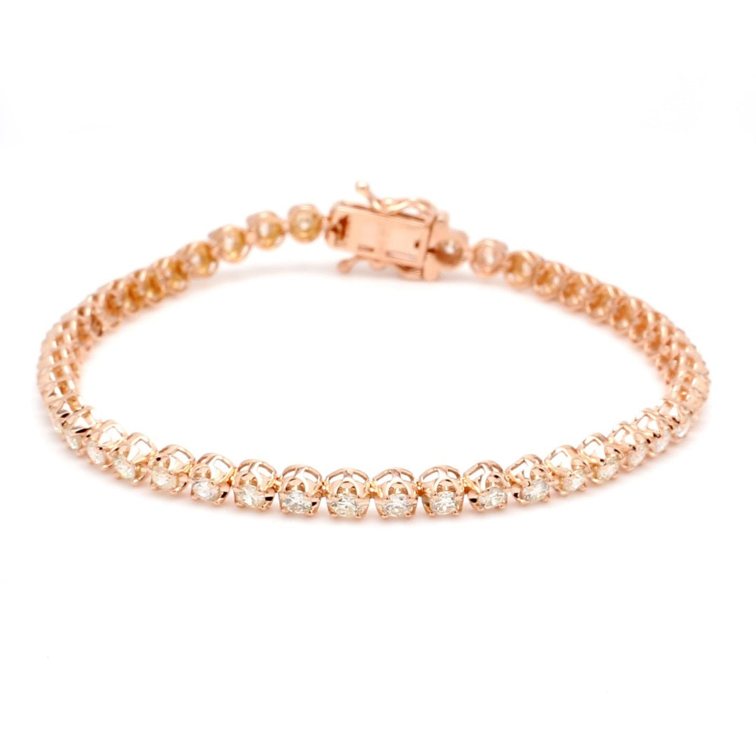 7 Tennis bracelet in 14K RG with crown head prong set (47) round diamonds.  D2.74ct.t.w.