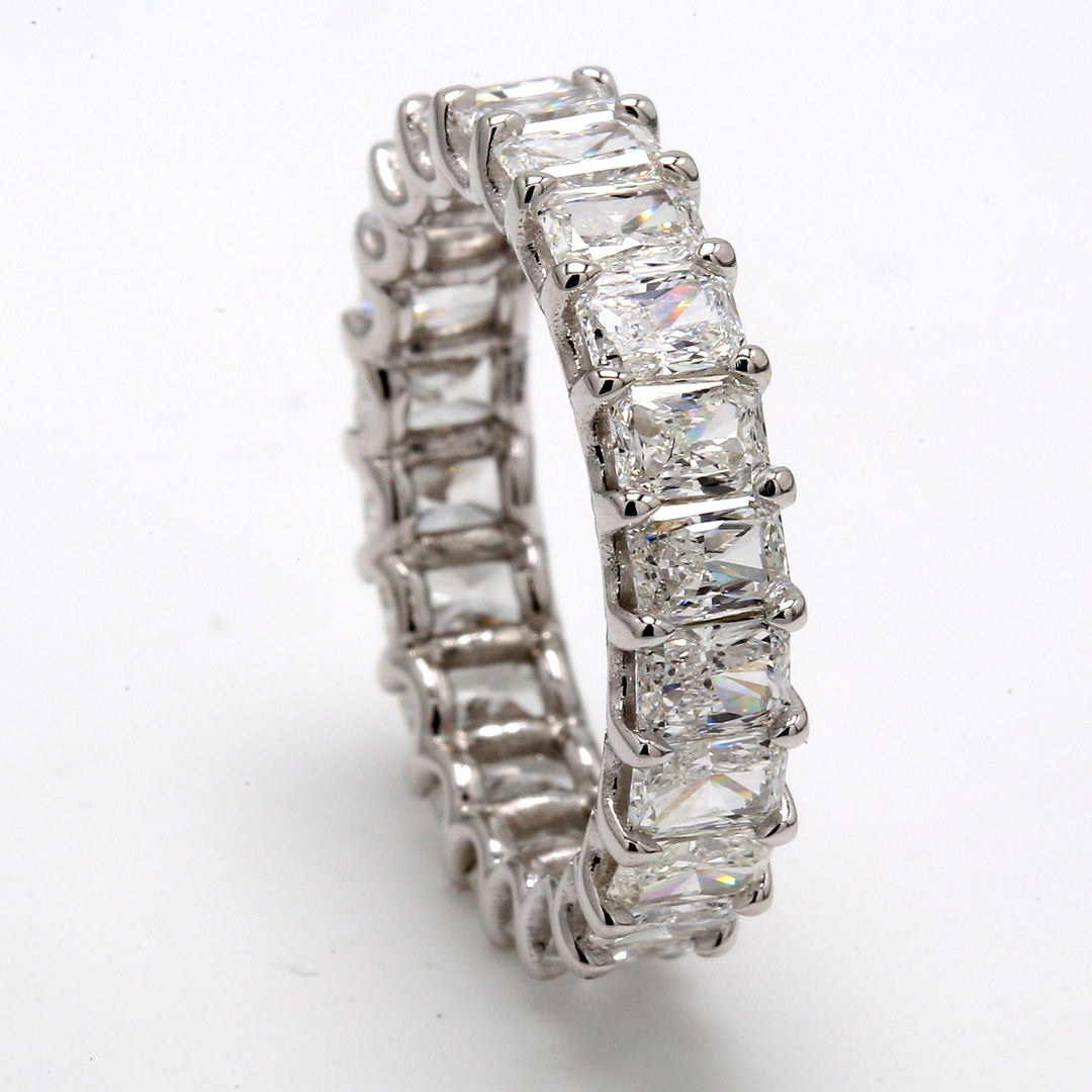 Eternity band in platinum with U-prong set (22) radiant cut diamonds.  D3.41ct.t.w.  Size 5