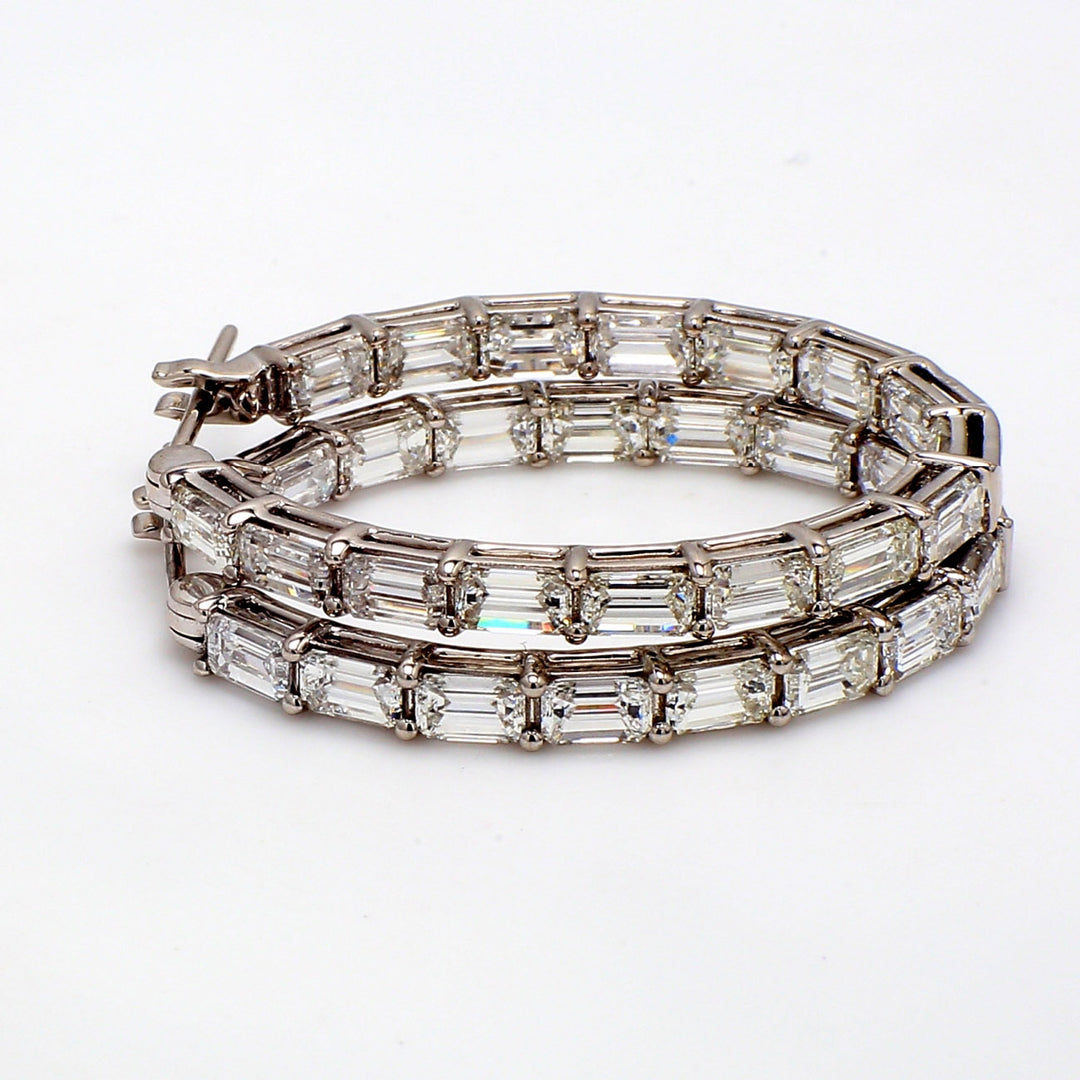 1"" Inside out hoop earrings in 18K WG with prong set (32) emerald cut diamonds.  D6.04ct.t.w.