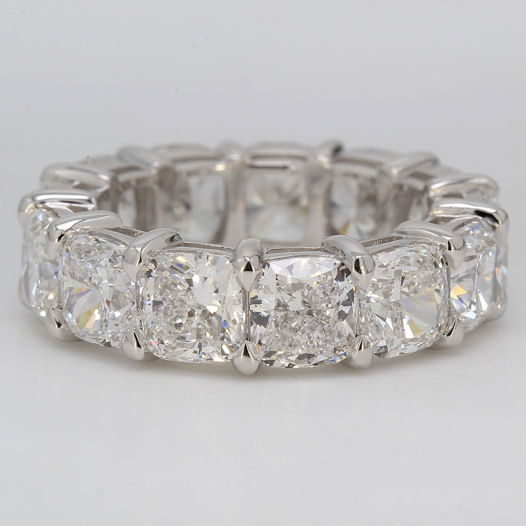 Eternity band in platinum with basket set GIA certified D-F/SI1 (13) cushion cut diamonds.  D13.20ct.t.w.  Size 7