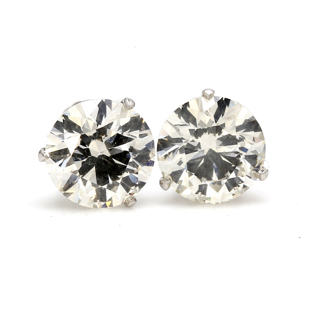 Screw back stud earrings with 3-prong set GIA certified L/SI2 and USA certified J/SI2 round diamonds.  D4.00ct.t.w.