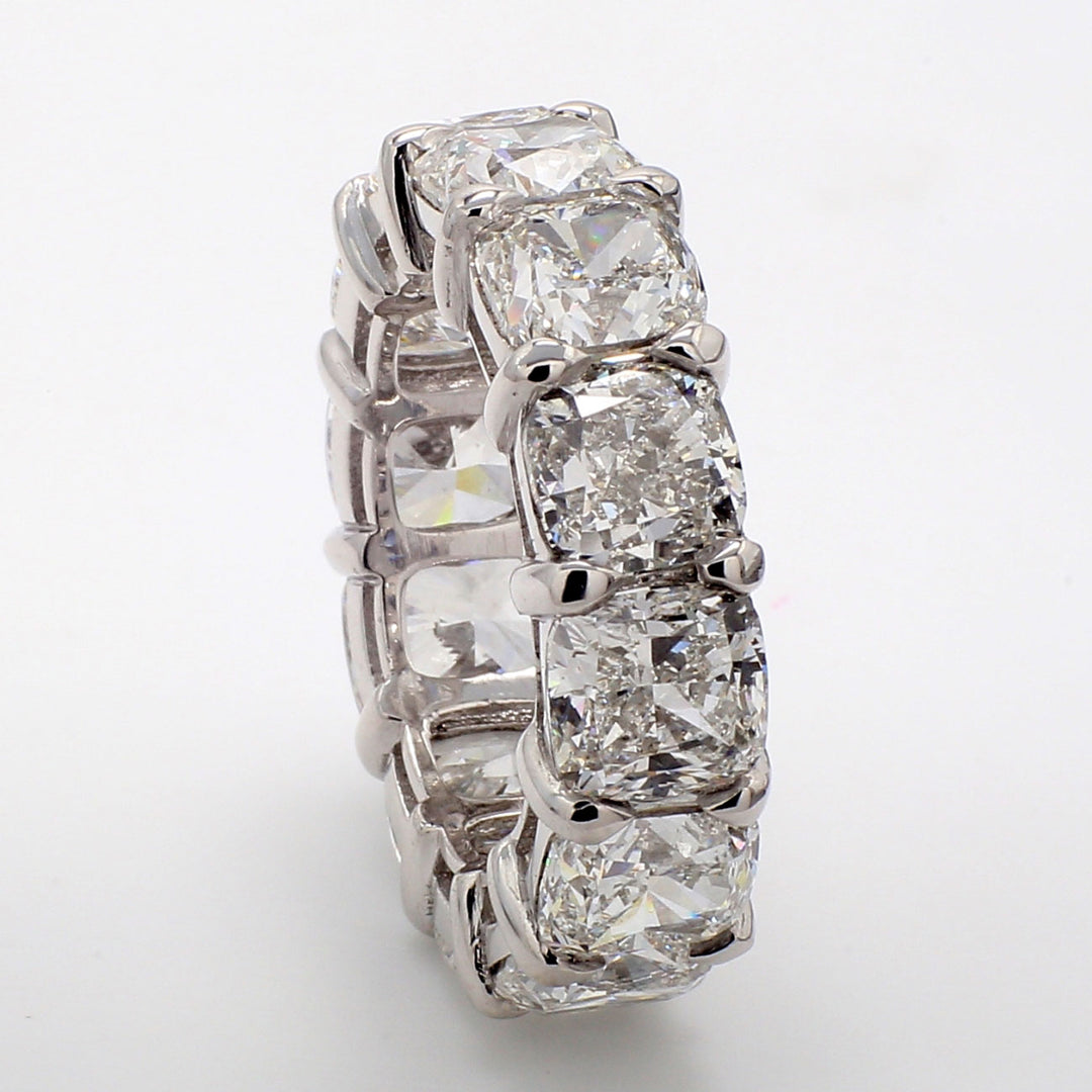 Eternity band in platinum with basket set GIA certified E-G/VVS1-VS2 (12) cushion cut diamonds.  D18.11ct.t.w.  Size 7