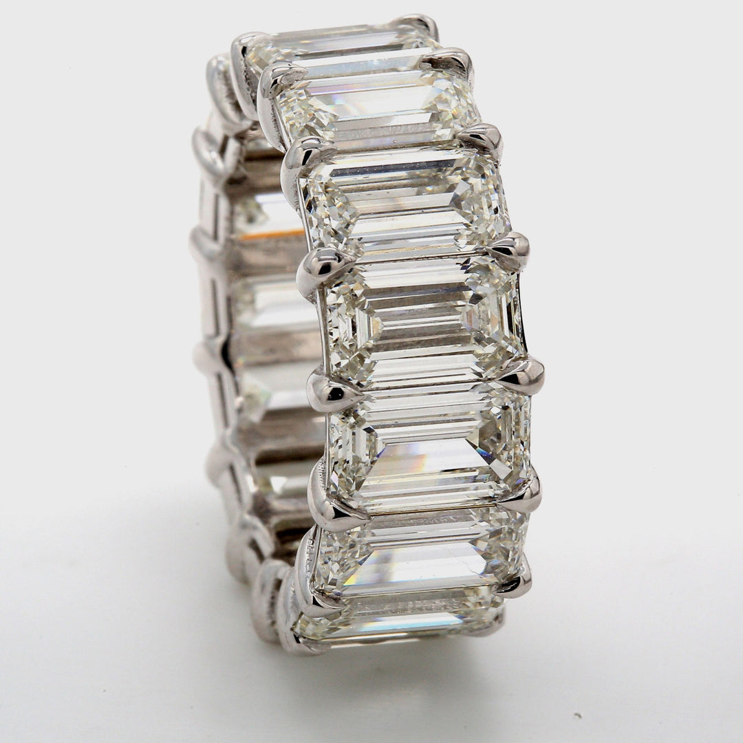 Eternity band in platinum with claw prong basket set GIA certified I-J/IF-VS2 (15) emerald cut diamonds.  D15.33ct.t.w.  Size 7