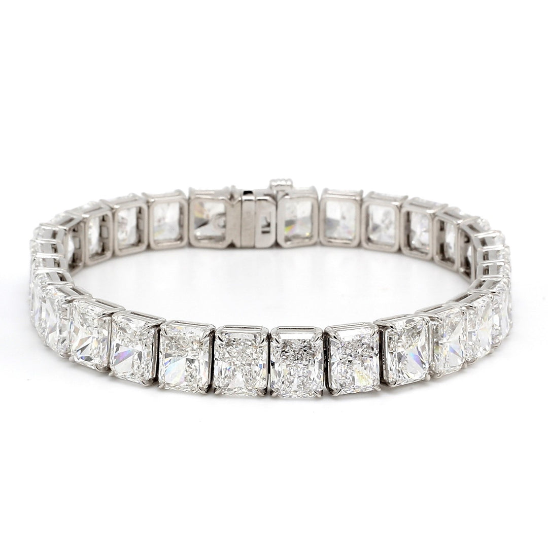 7"" Tennis bracelet in platinum with basket prong set GIA certified D-H/VVS1-SI1 (30) radiant cut diamonds.  D45.35ct.t.w.