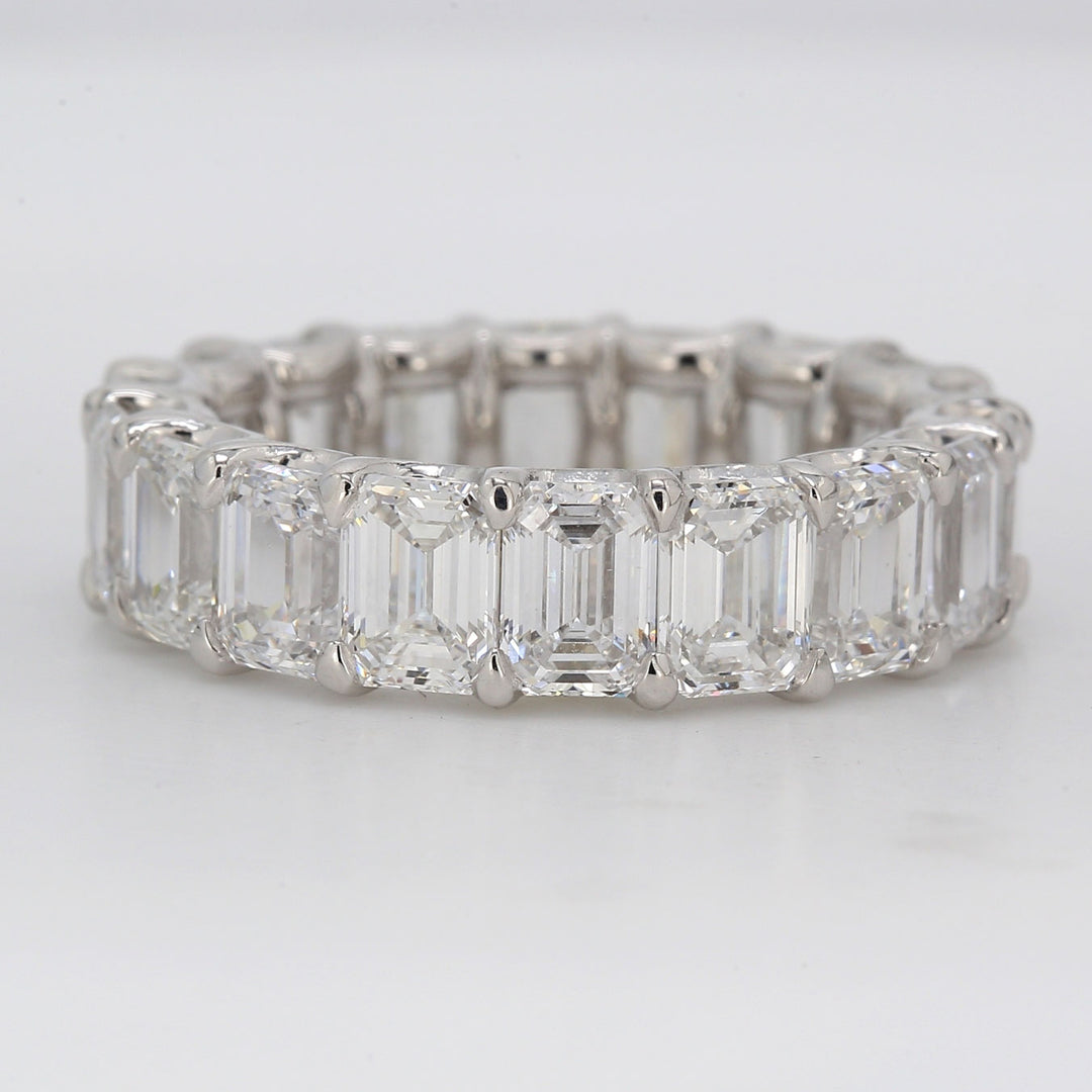 Eternity band in platinum with shapred U-prong set GIA certified D-F/IF-VS2 emerald cut diamonds.  D8.43ct.t.w.  Size 6.5