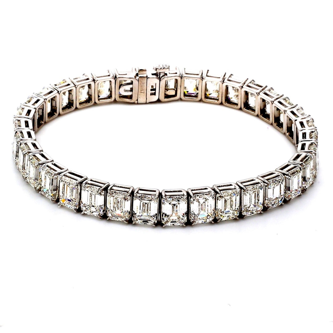7"" Tennis bracelet in platinum with basket prong set GIA certified H-J/IF-VS2 (35) emerald cut diamonds.  D35.22ct.t.w.