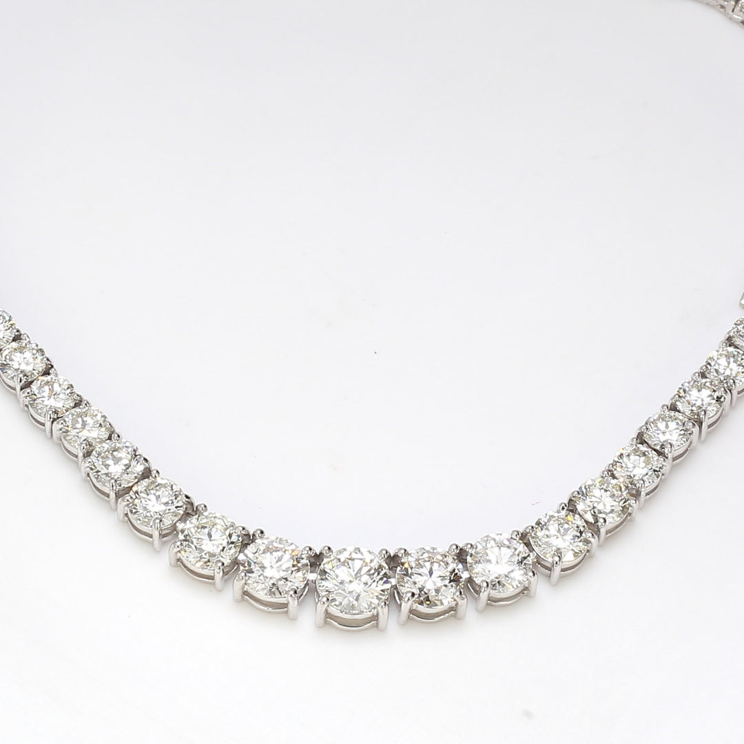 18"" Graduated tennis necklace with 4-prong set round diamonds.  D29.08ct.t.w.