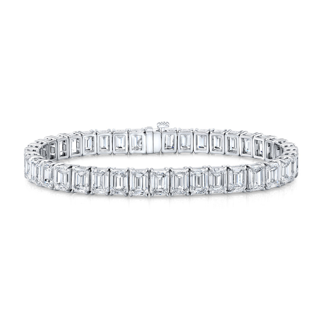 7"" Tennis bracelet in platinum with basket prong set GIA certified G-I/VVS1-VS2 (39) emerald cut diamonds.  D27.80ct.t.w.