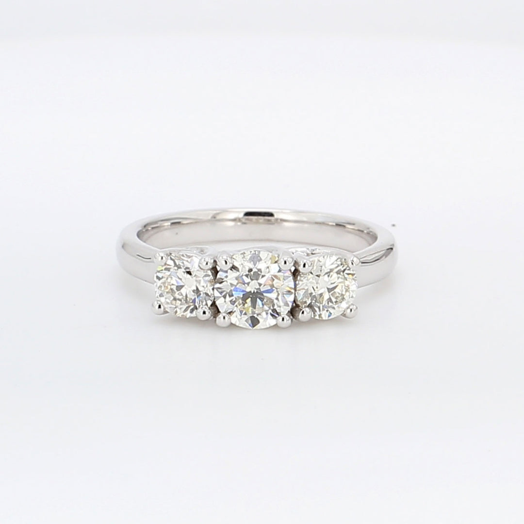 3-stone ring with lucida style 4-prong set round diamonds.  D1.90ct.t.w.  (Center 0.90ct.)  Size 8.5