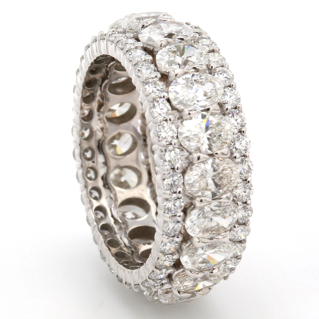 3-row eternity band with prong set (20) ovals and (66) round diamonds.  D6.37ct.t.w.  Size 7.25