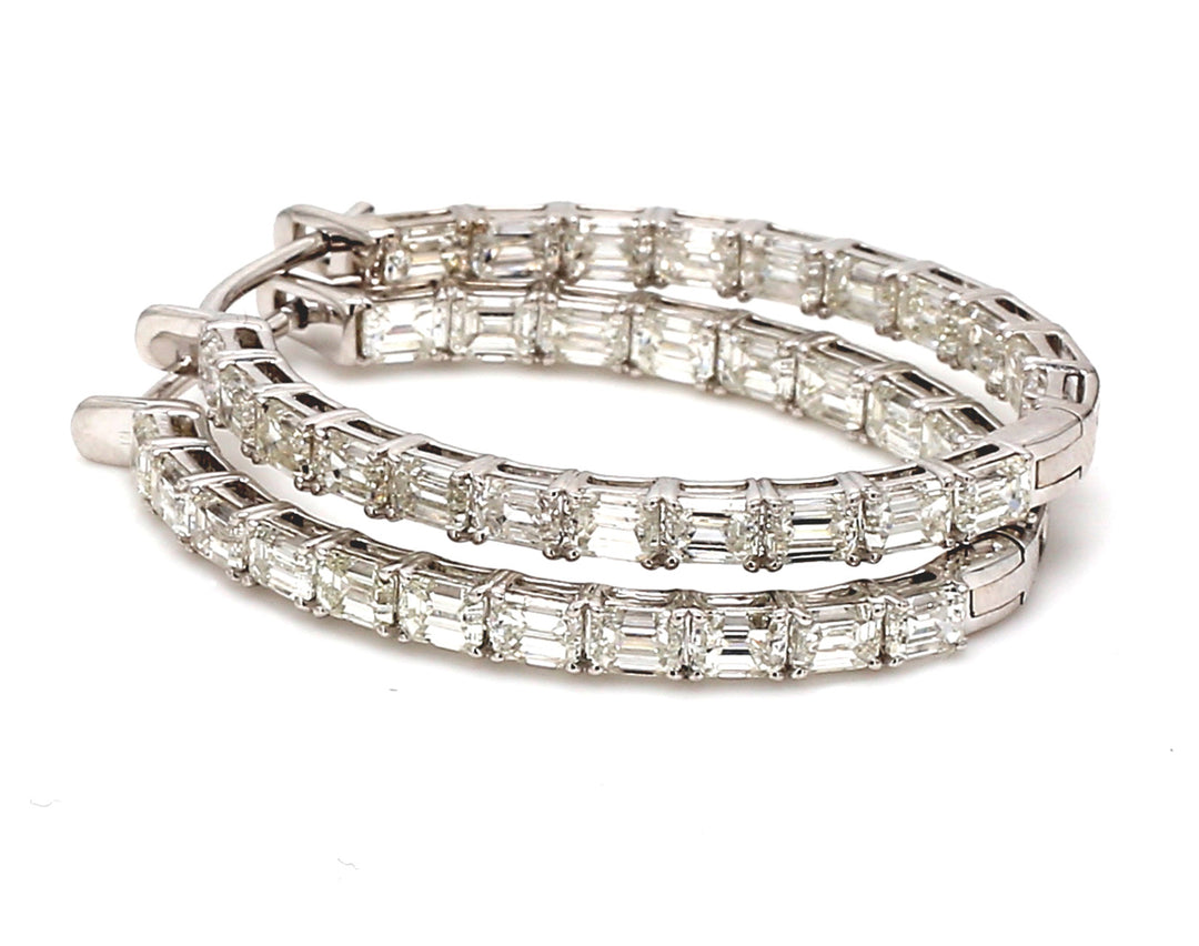 1.5"" Inside out hoop earrings in 18K WG with basket prong set (46) emerald cut diamonds.  D8.85ct.t.w.