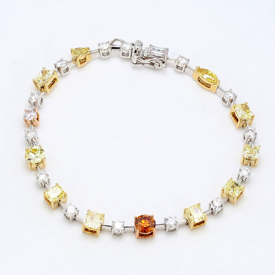 7.5"" Bracelet in 18K WG with mixed diamond shapes and multi colored GIA certified diamonds.  D8.70ct.t.w.  (GIA certified 6.54ct.tw)