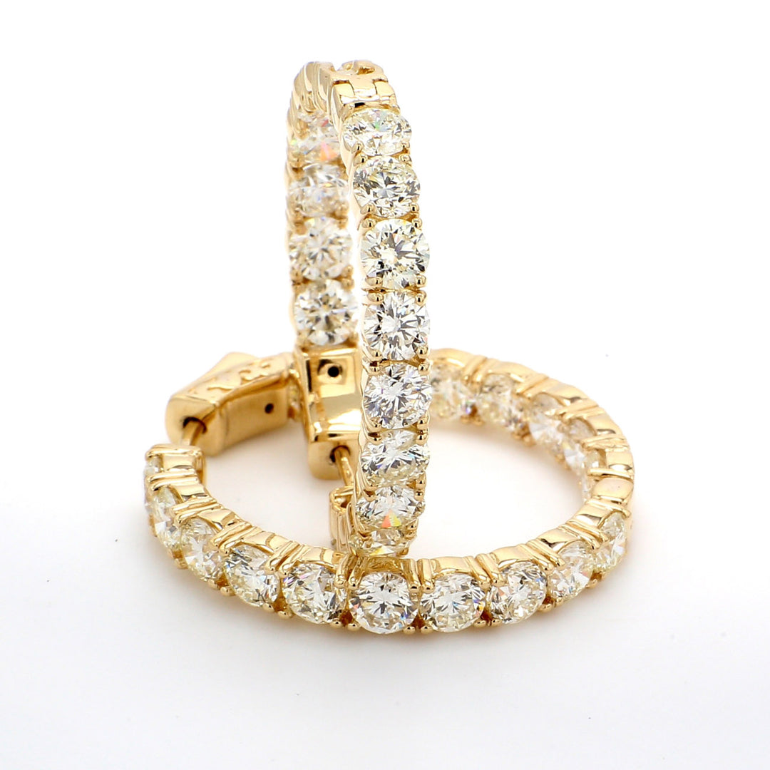 1"" Inside out hoop earrings with prong set (34) round diamonds.  D8.16ct.t.w.