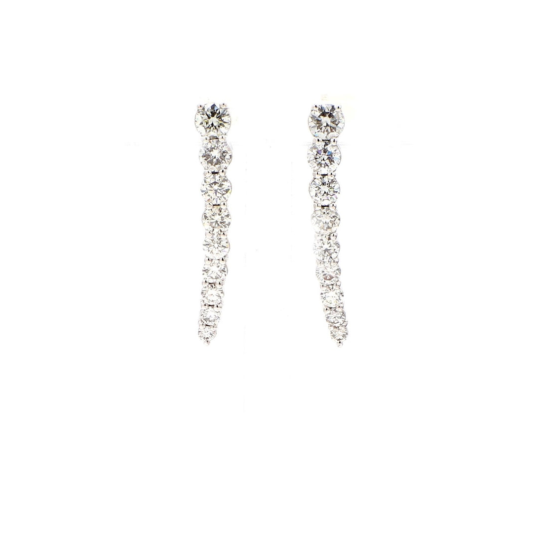 Dangling earrings in platinum with shared prong set round diamonds.  D1.47ct.t.w.