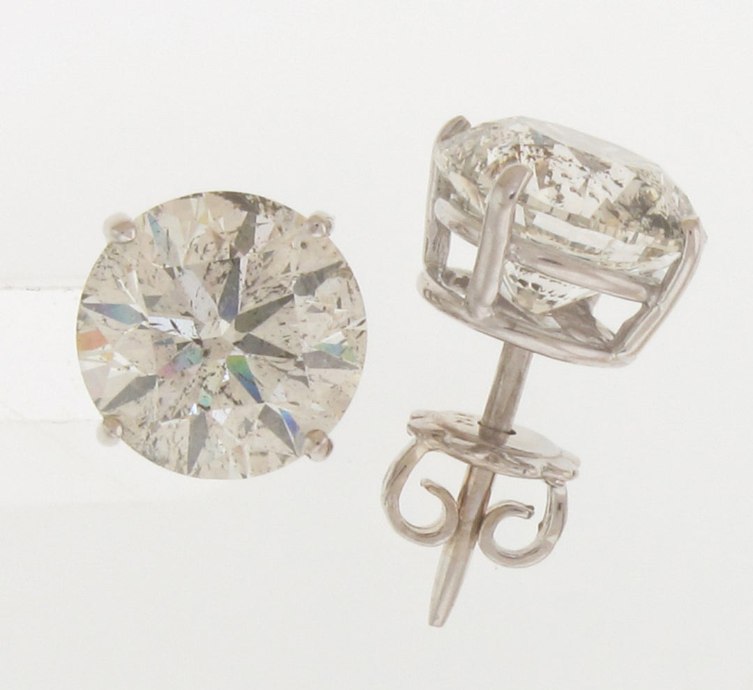 Push back stud earrings with 4-prong set USA certified J-K/SI1 round diamonds.  D2.01ct.t.w.
