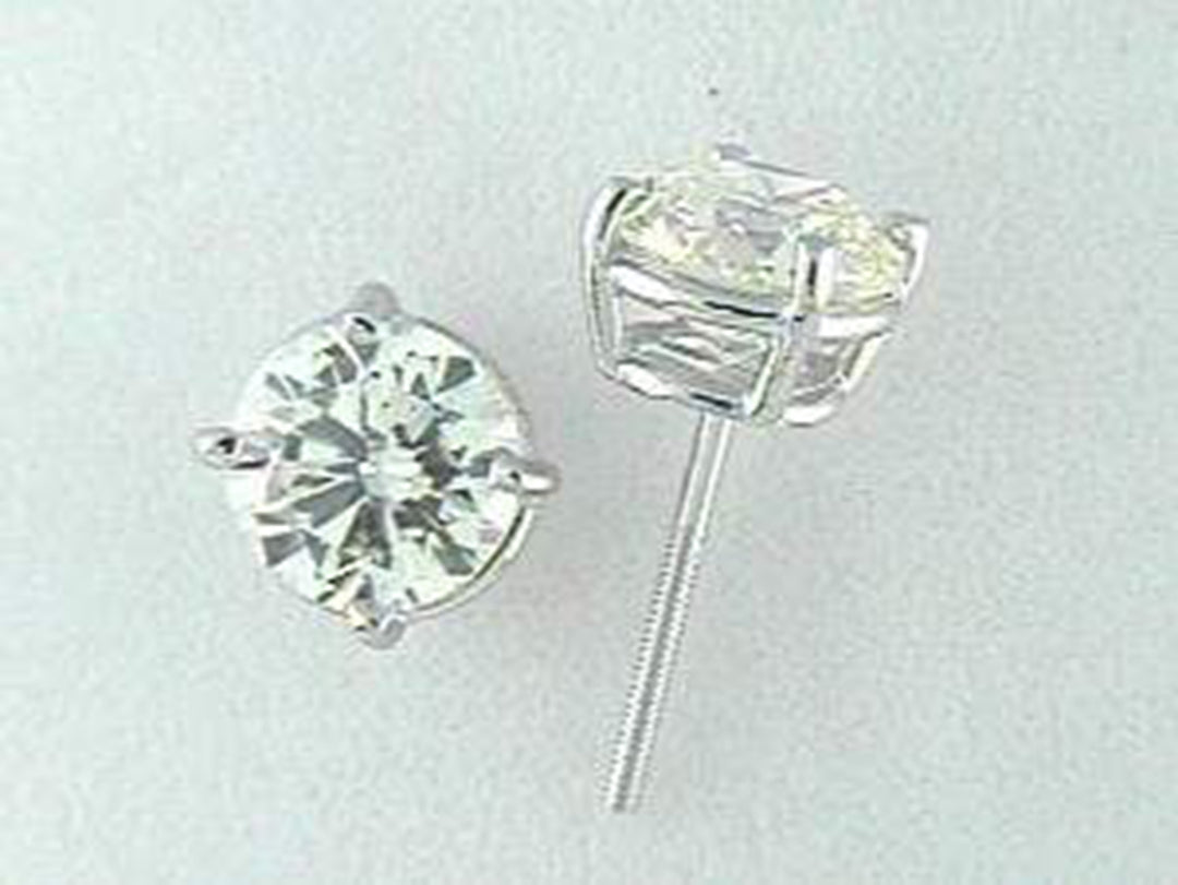Push back stud earrings with basket prong set USA certified J-K/SI1-SI2 round diamonds.  D6.01ct.t.w.