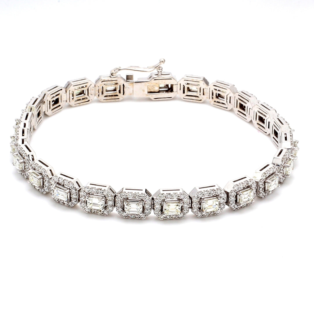 7"" Halo tennis bracelet with prong set rounds and emerald cut diamonds.  D7.10ct.t.w.