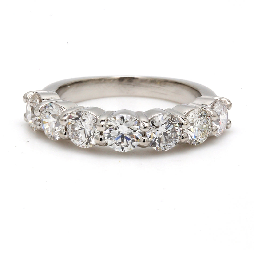 7 -stone band in platinum with prong set round diamonds.  D1.46ct.t.w.  Size 3.75