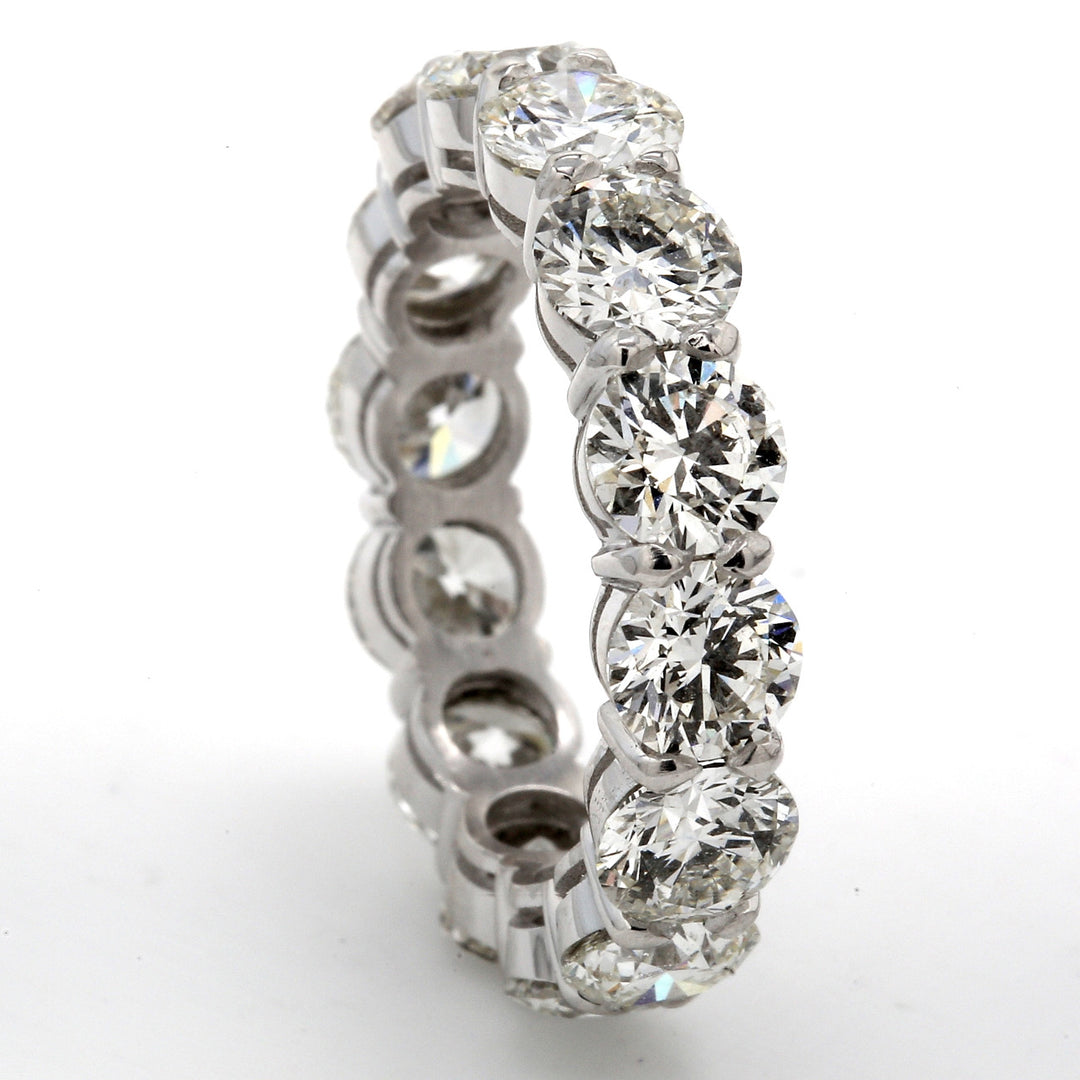 Eternity band in platinum with basket claw prong set (14) round diamonds.  D6.52ct.t.w.  Size 7