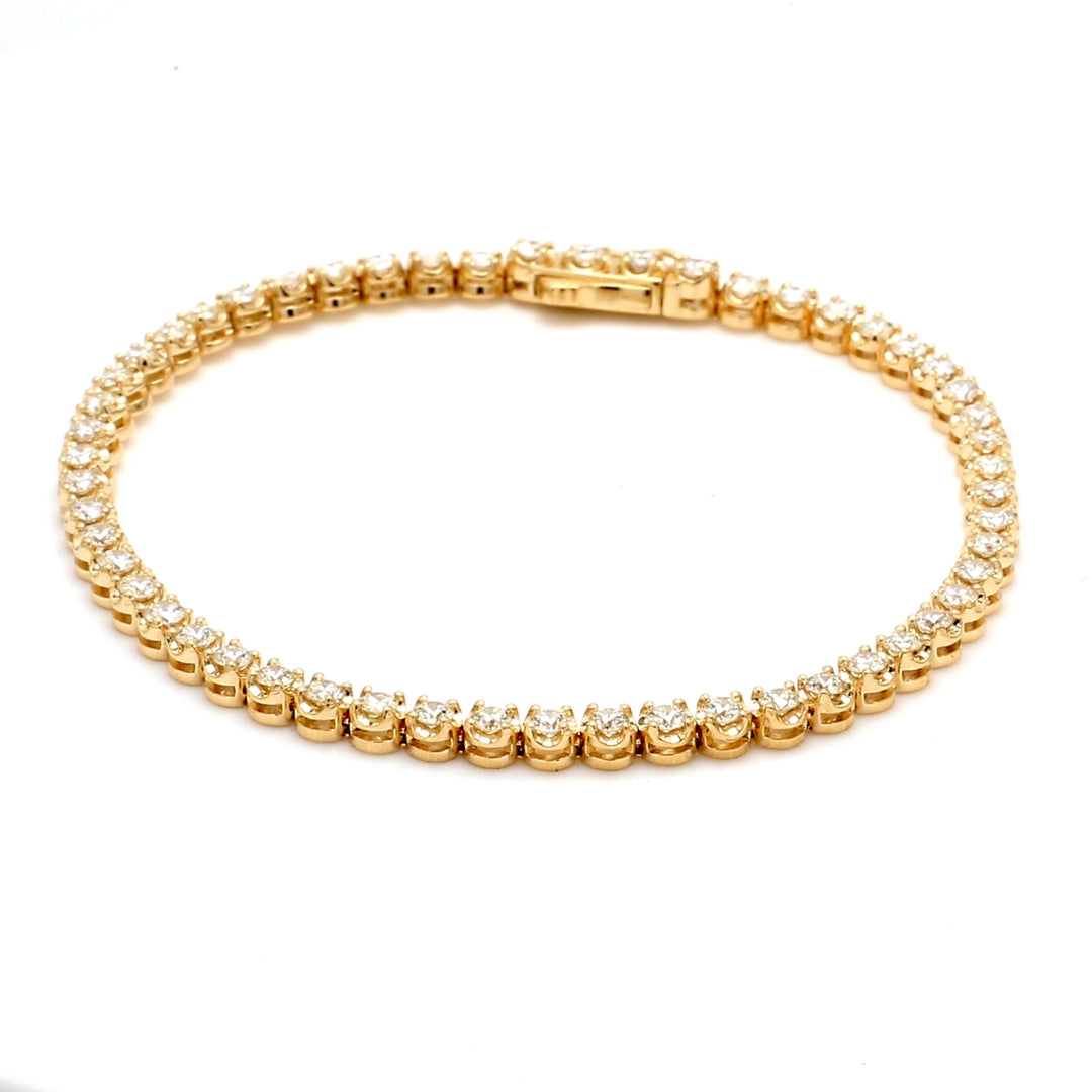 7"" Tennis bracelet with crown head prong set (54) round diamonds.  D7.68ct.t.w.