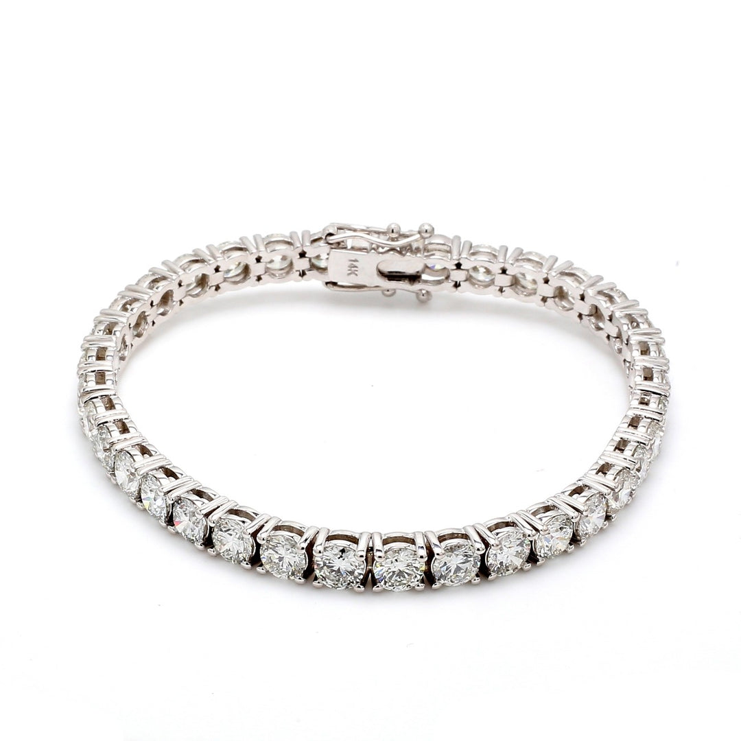 7"" Tennis bracelet with basket 4-prong set GIA certified G-I/SI1-SI2 (35) round diamonds.  D14.04ct.t.w.