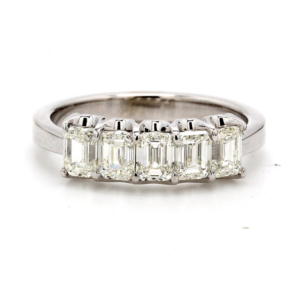 5-stone band in platinum with U-prong set emerald cut diamonds.  D1.53ct.t.w.  Size 6.75