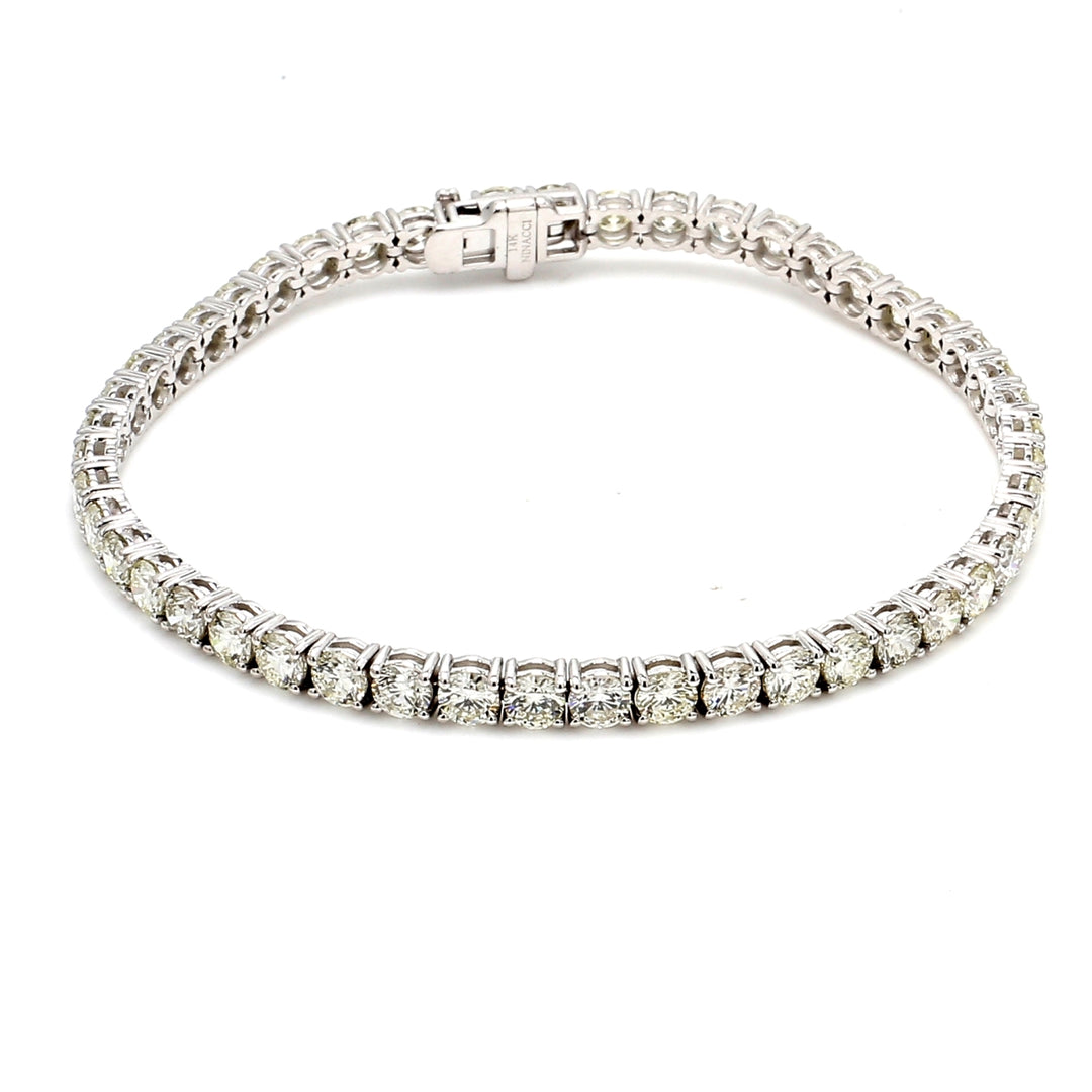 7"" Tennis bracelet with 4-prong basket set (48) round diamonds.  D7.93ct.t.w.