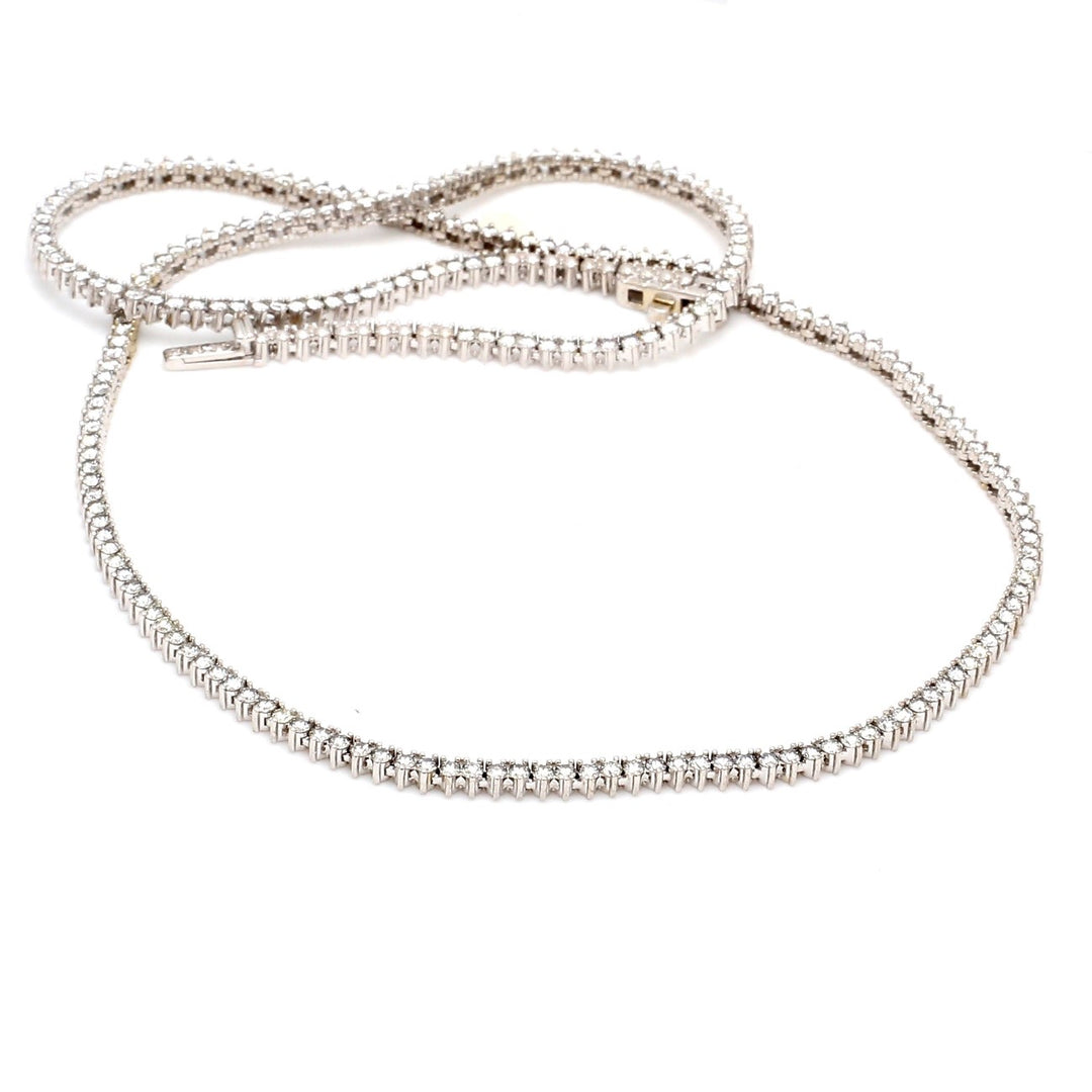 18"" Tennis necklace with 3-prong set (228) round diamonds.  D5.00ct.t.w.