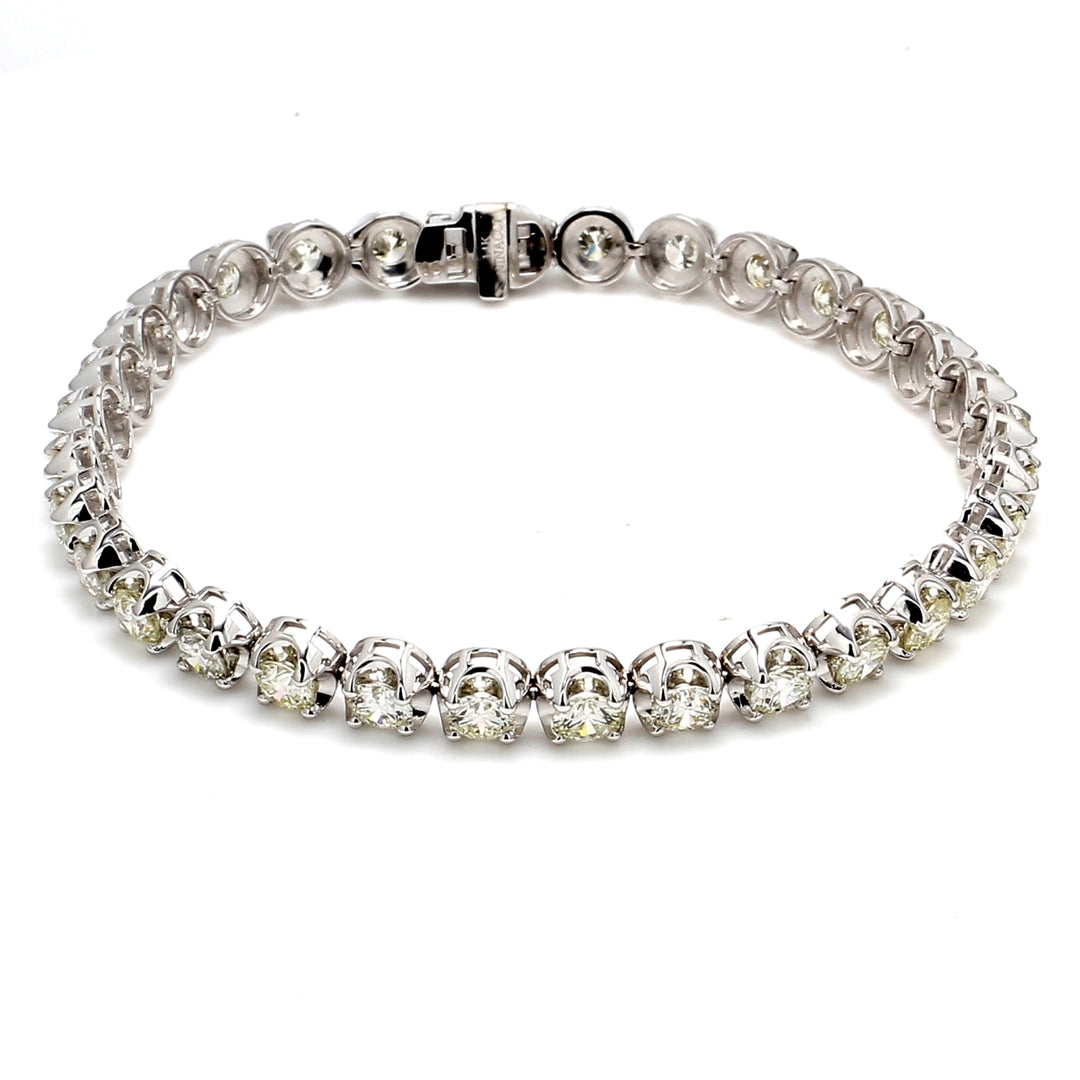 7"" Tennis bracelet with crown head set (32) round diamonds.  D7.66ct.t.w.