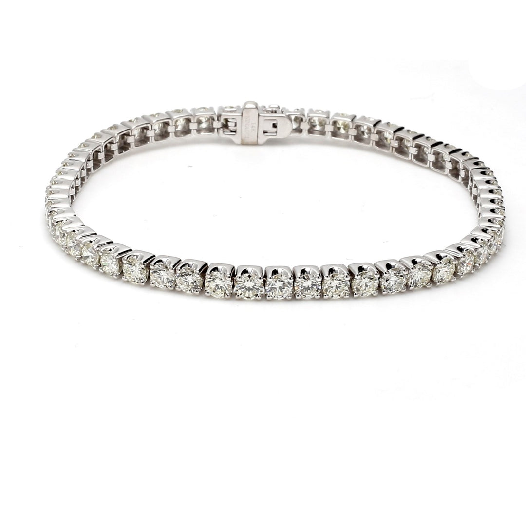 7"" Tennis bracelet with crown head set (51) round diamonds.  D7.56ct.t.w.