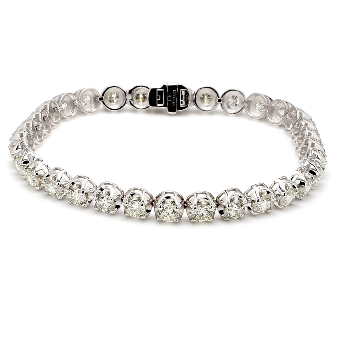 7"" Tennis bracelet with crown head prong set (32) round diamonds.  D8.28ct.t.w.