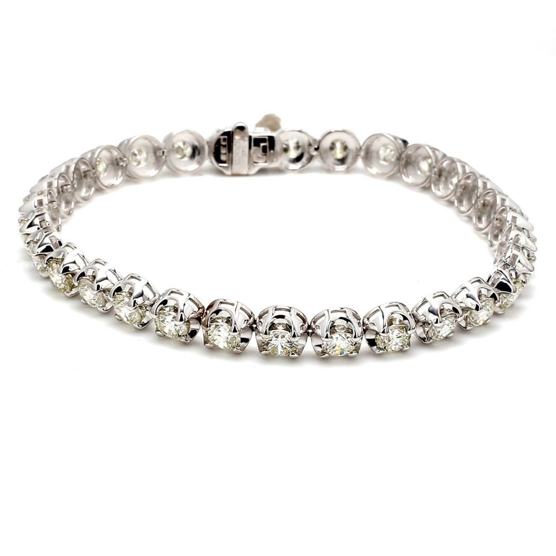 7"" Tennis bracelet with crown head 4-prong set (30) round diamonds.  D8.47ct.t.w.