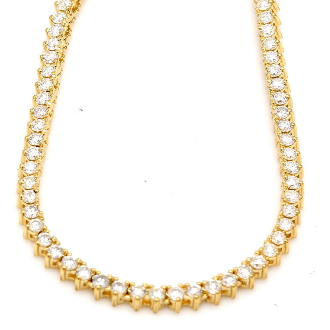 18"" Tennis necklace in 18K YG with 3-prong set (193) round diamonds.  D5.68ct.t.w.
