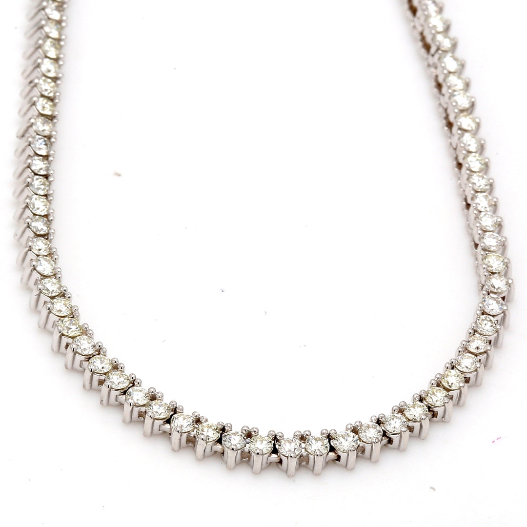 18"" Tennis necklace in 18K WG with 3-prong set (229) round diamonds.  D4.79ct.t.w.