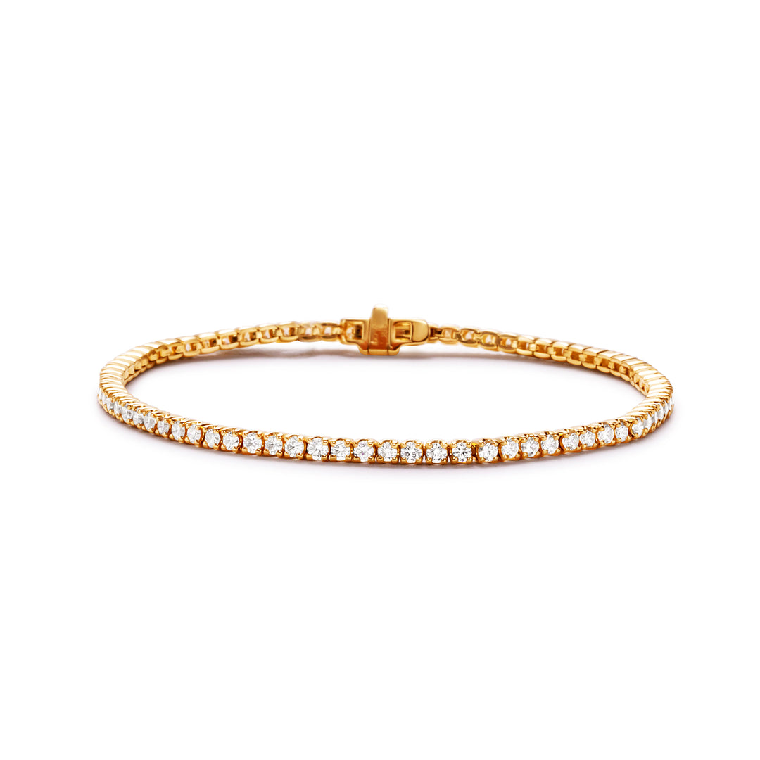 7"" Tennis bracelet in 14K YG with crown set (76) round diamonds.  D2.41ct.t.w.