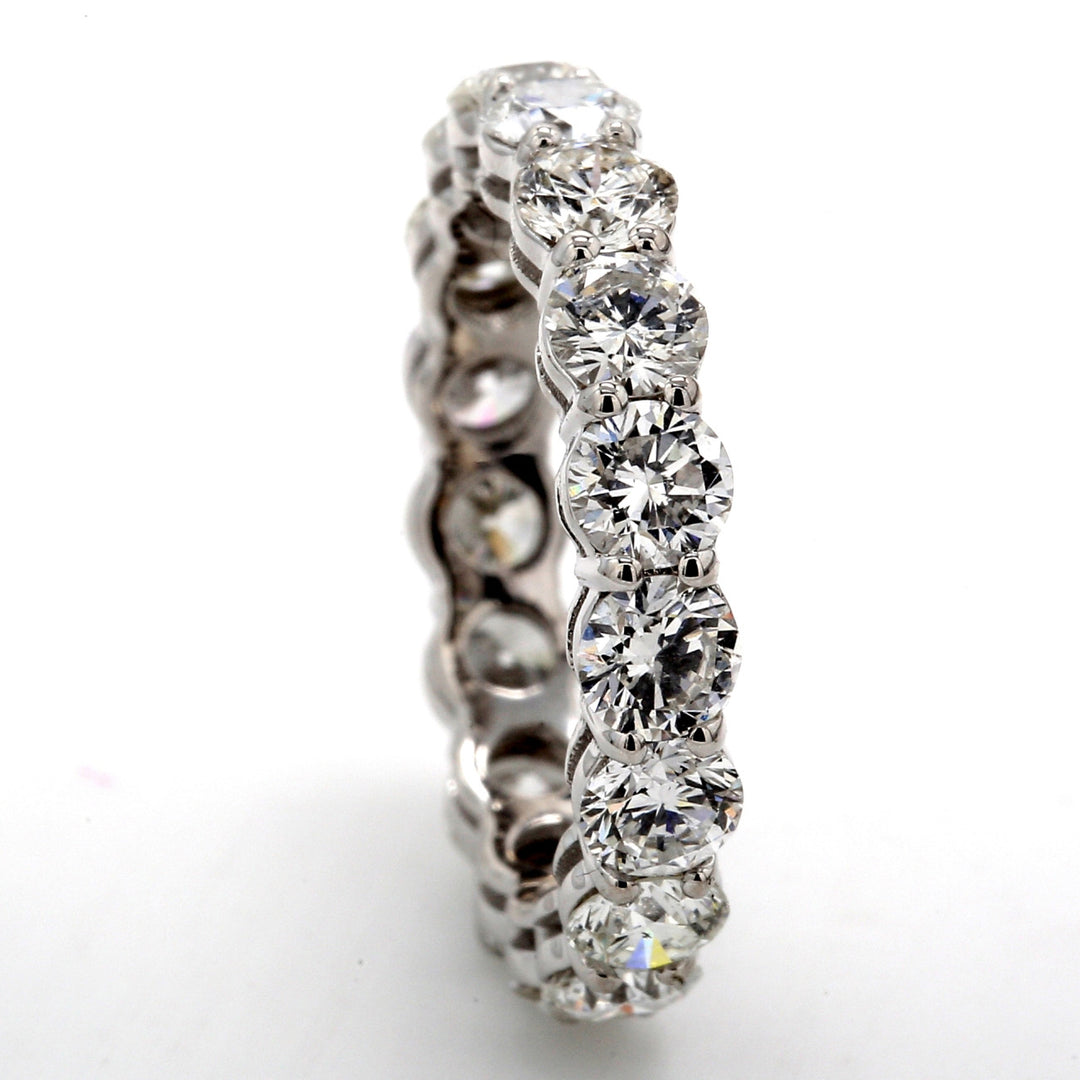 Eternity band with basket shared prong set (17) round diamonds.  D2.59ct.t.w.  Size 4