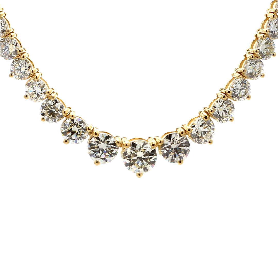16"" Graduating tennis necklace in 18K YG with 3-prong set round diamonds.  D17.19ct.t.w.  (Center 1.00ct.)