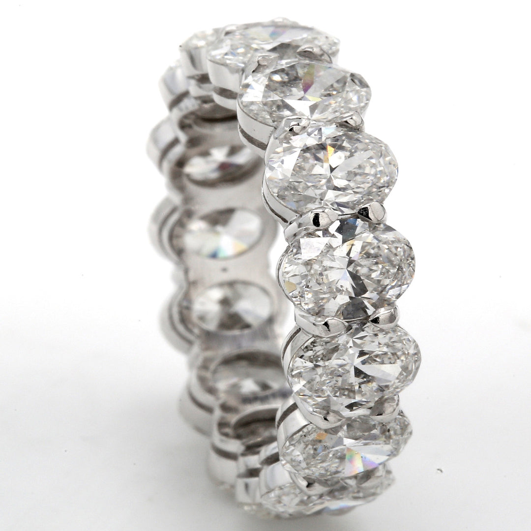 Eternity band in platinum with basket prong set (15) oval cut diamonds.  D7.49ct.t.w.  Size 6.25