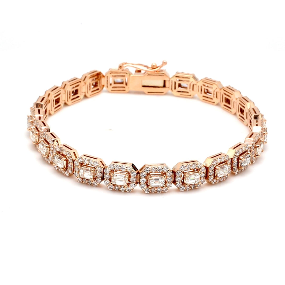 7"" Halo tennis bracelet in 14K RG with pre-set rounds around prong set (23) emerald cut diamond centers.  D7.86ct.t.w.  (Center 4.23ct.t.w.)