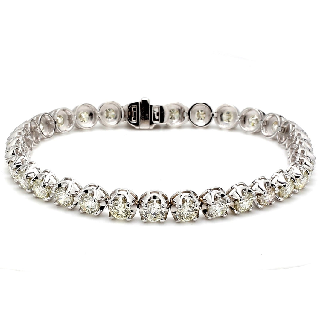 7"" Tennis bracelet with crown head set (32) round diamonds.  D7.87ct.t.w.