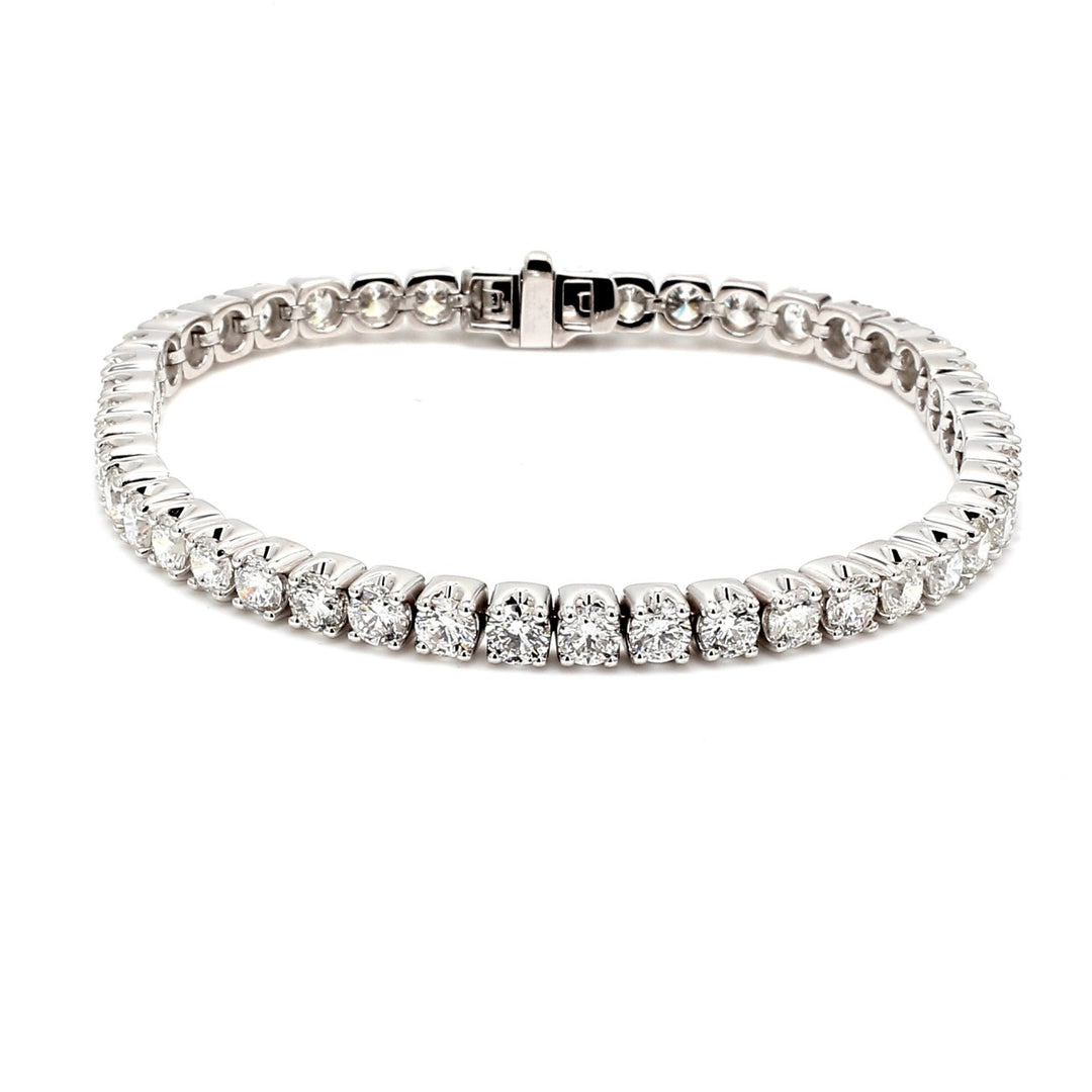 7"" Tennis bracelet with crown set (51) round diamonds.  D7.75ct.t.w.