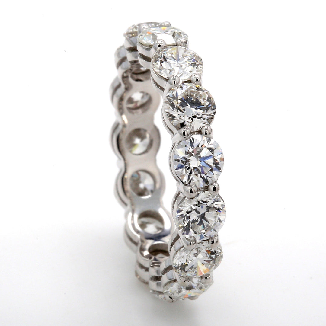 Eternity band in platinum with basket prong set (15) round diamonds.  D2.99ct.t.w.  Size 4