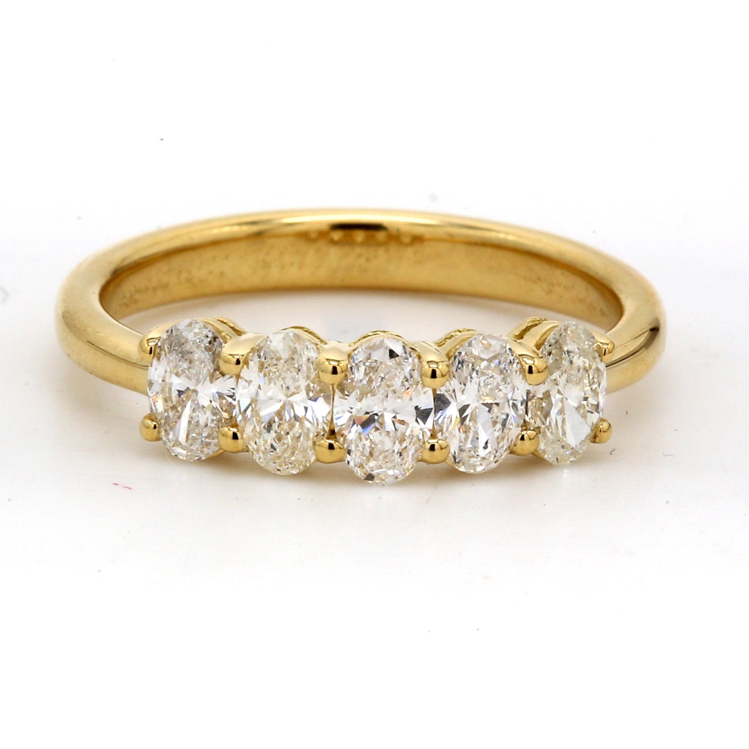 5-stone band in 18K YG with basket prong set oval cut diamonds.  D1.50ct.t.w.  Size 7.5