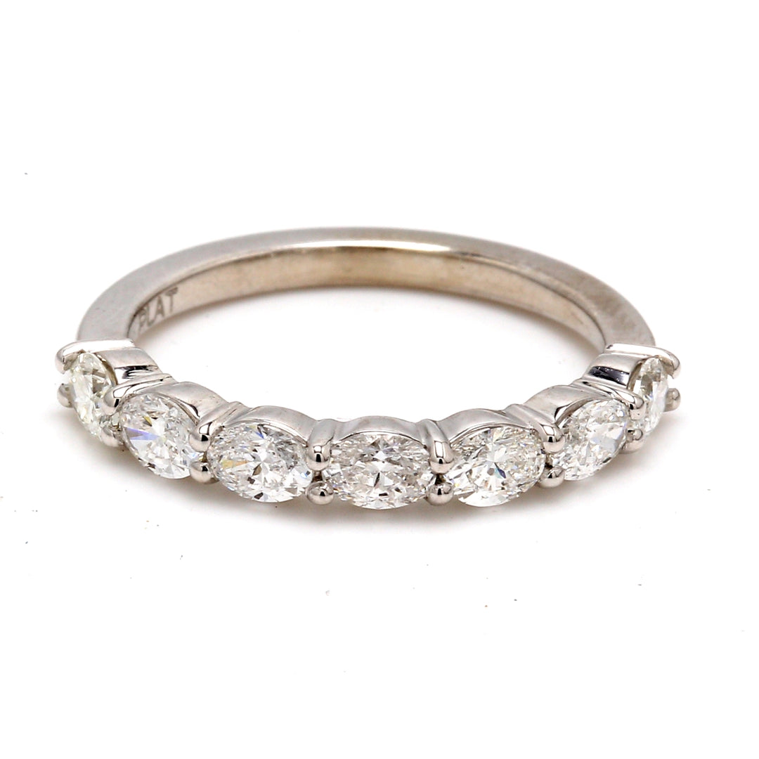 7 -stone band east to west style in platinum with prong set oval cut diamonds.  D0.95ct.t.w.  Size 6.5