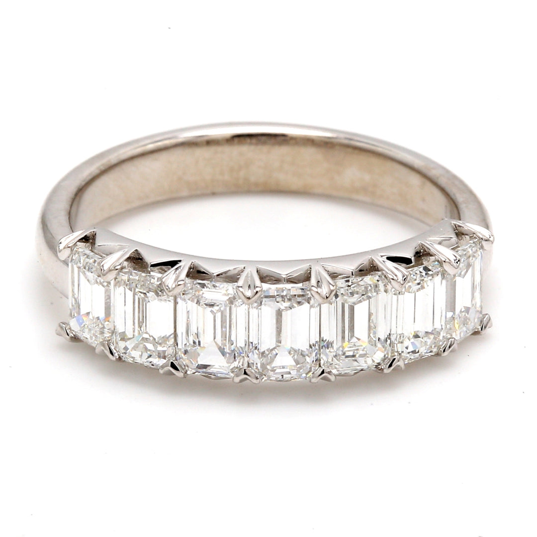 7 -stone band in platinum with prong set emerald cut diamonds.  D1.89ct.t.w.  Size 7