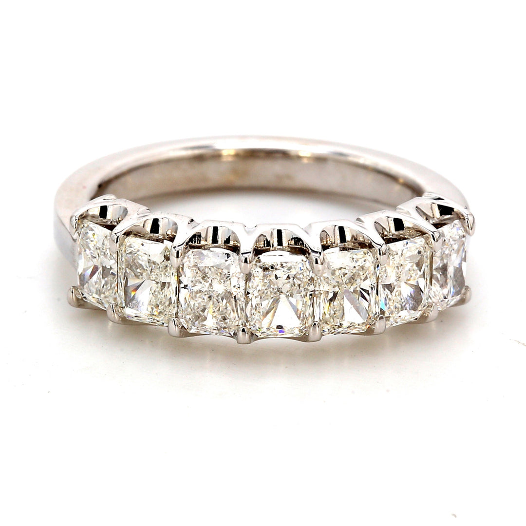 7-stone band in platinum with shared prong set radiant diamonds.  D1.77ct.t.w.