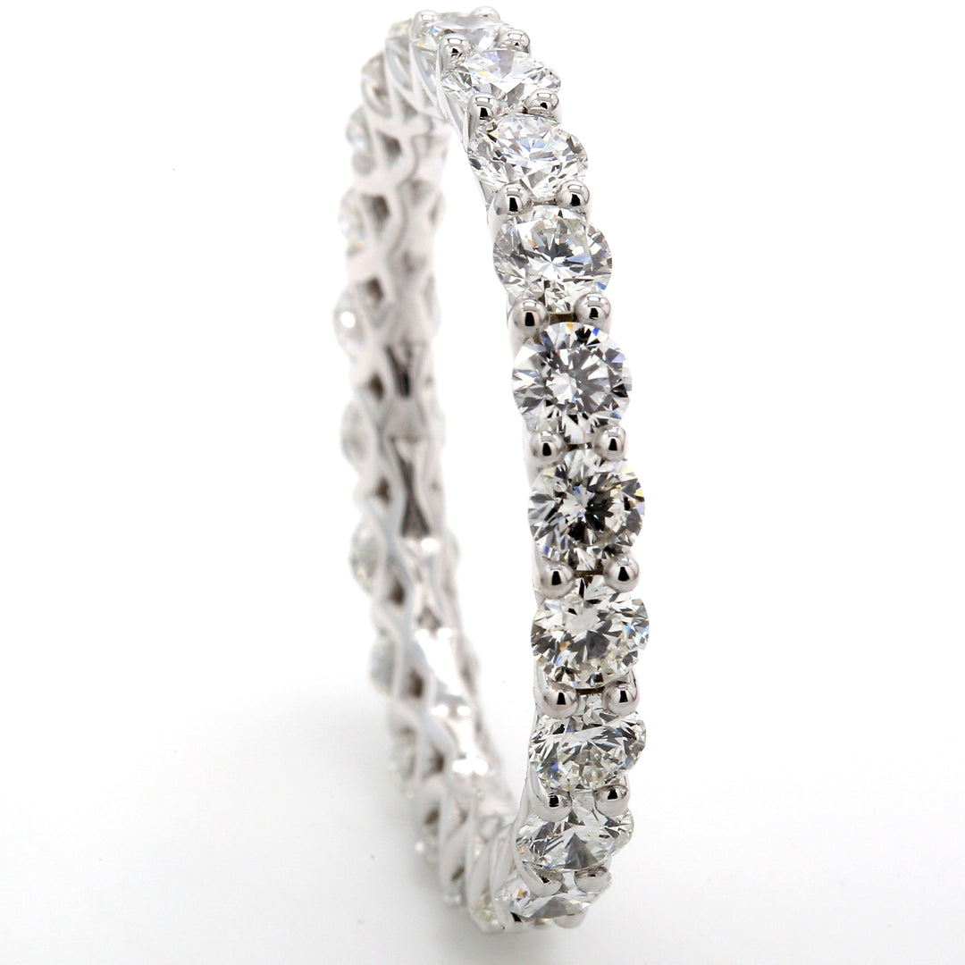 Eternity band in platinum with shared prong set round diamonds.  D2.84ct.t.w.  Size 9.25