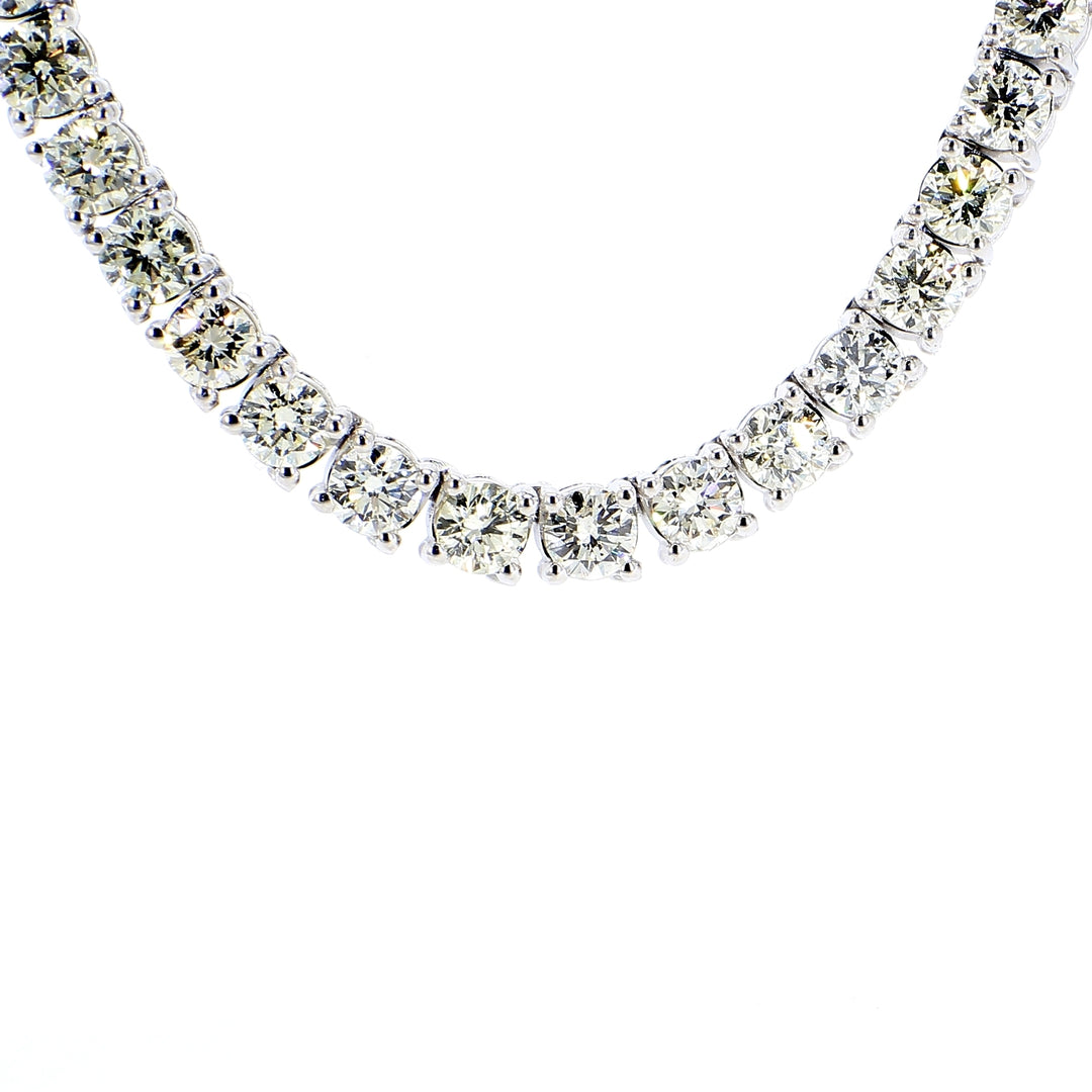 20"" Tennis necklace in 18K WG with 4-prong basket set (101) round diamonds.  D28.66ct.t.w.
