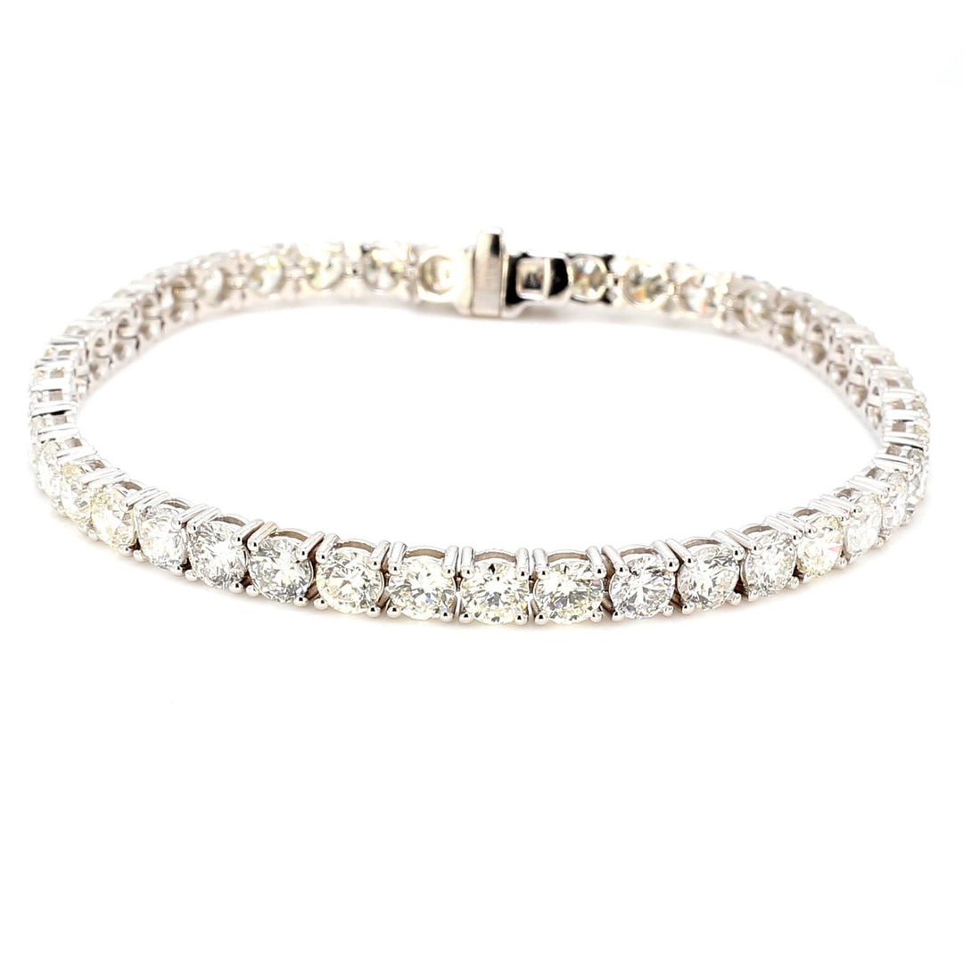 7"" Tennis bracelet with 4-prong basket set (42) round diamonds.  D10.76ct.t.w.
