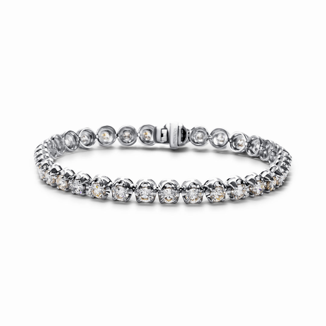 7"" Tennis bracelet with crown head style 4-prong set (34) round diamonds.  D6.35ct.t.w.